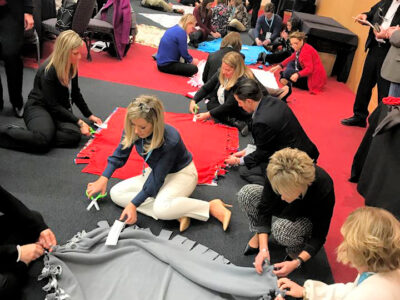 Featured Image For International Volunteer Day: What It Is & How To Participate Team Building Post