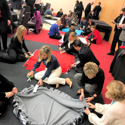 Featured Image For International Volunteer Day: What It Is & How To Participate Team Building Post
