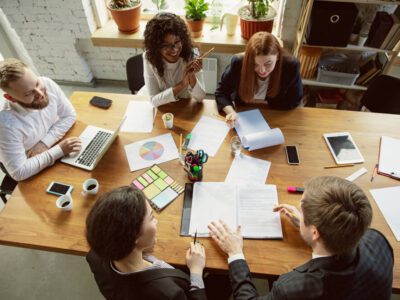 Featured Image For What It Means To Be Team-Oriented Team Building Post
