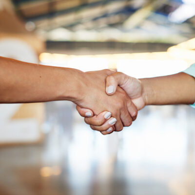 Featured Image For How To Motivate Teams After Layoffs & Mergers: Tips, Tricks, & Advice Team Building Post