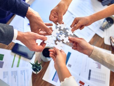 Featured Image For How To Build High-Performing Teams: 8 Essential Attributes Team Building Post